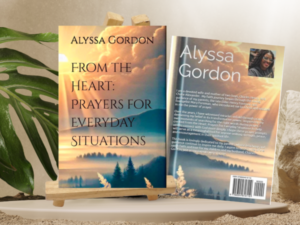 Book cover in light pastels. Front and back cover of book on a table. Front of book is on an easel.