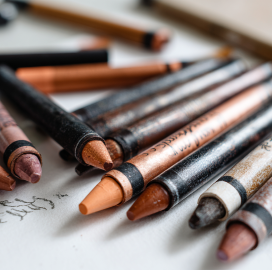 Crayons in different brown and tan shades representing diversity in children’s art.
